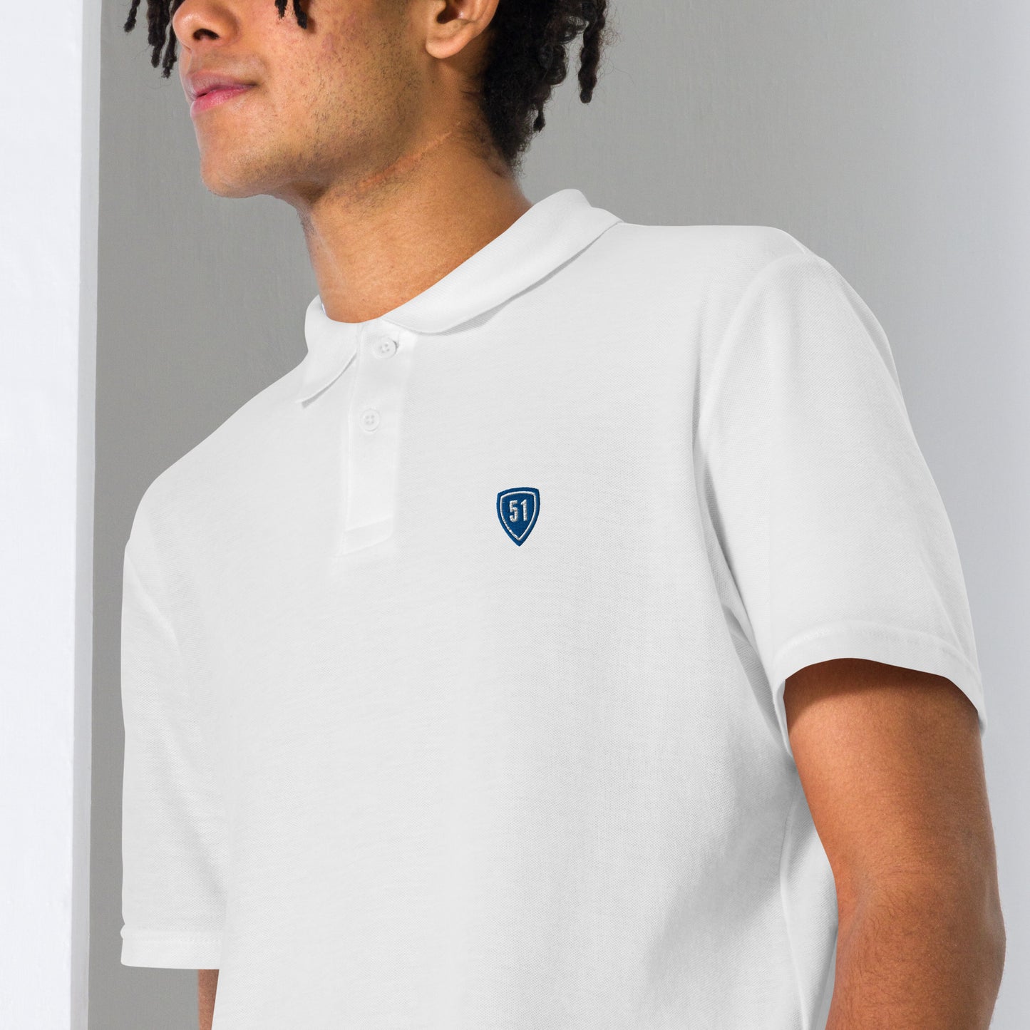 Blue Shield 51 small logo unisex pique polo shirt